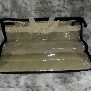 Clear and black trim purse protector Large